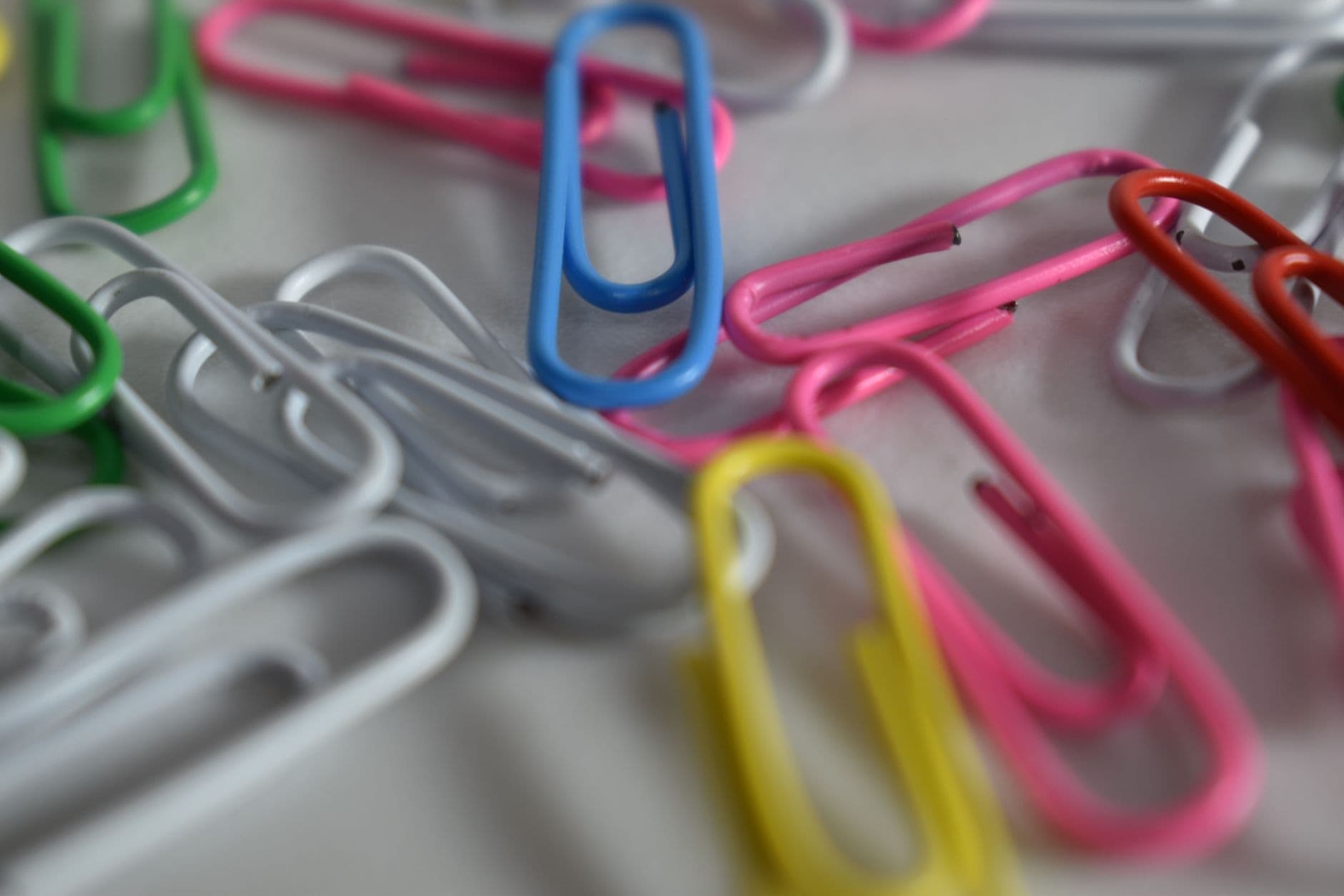 Coloured paper clips in close-up