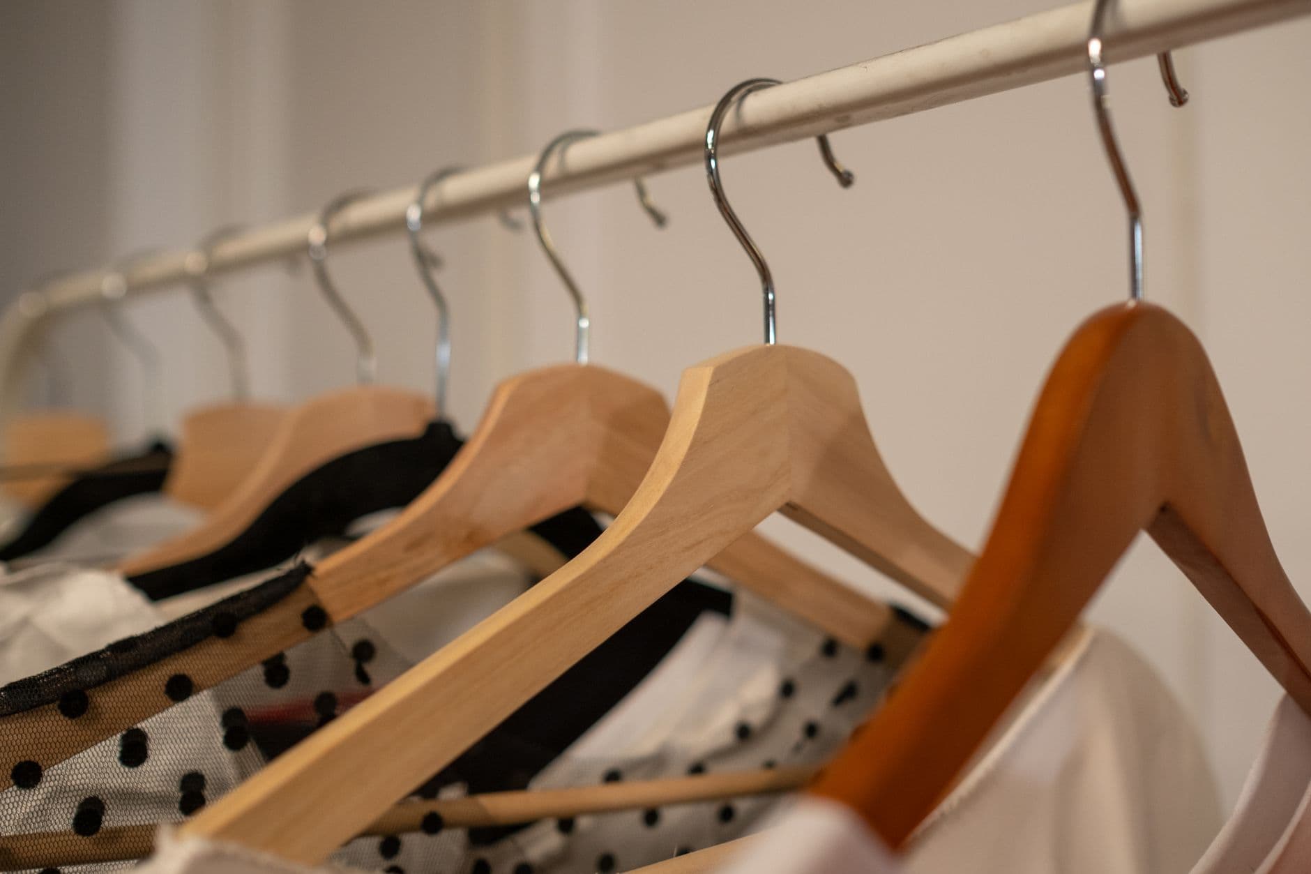 Garments hanging on a clothing rail
