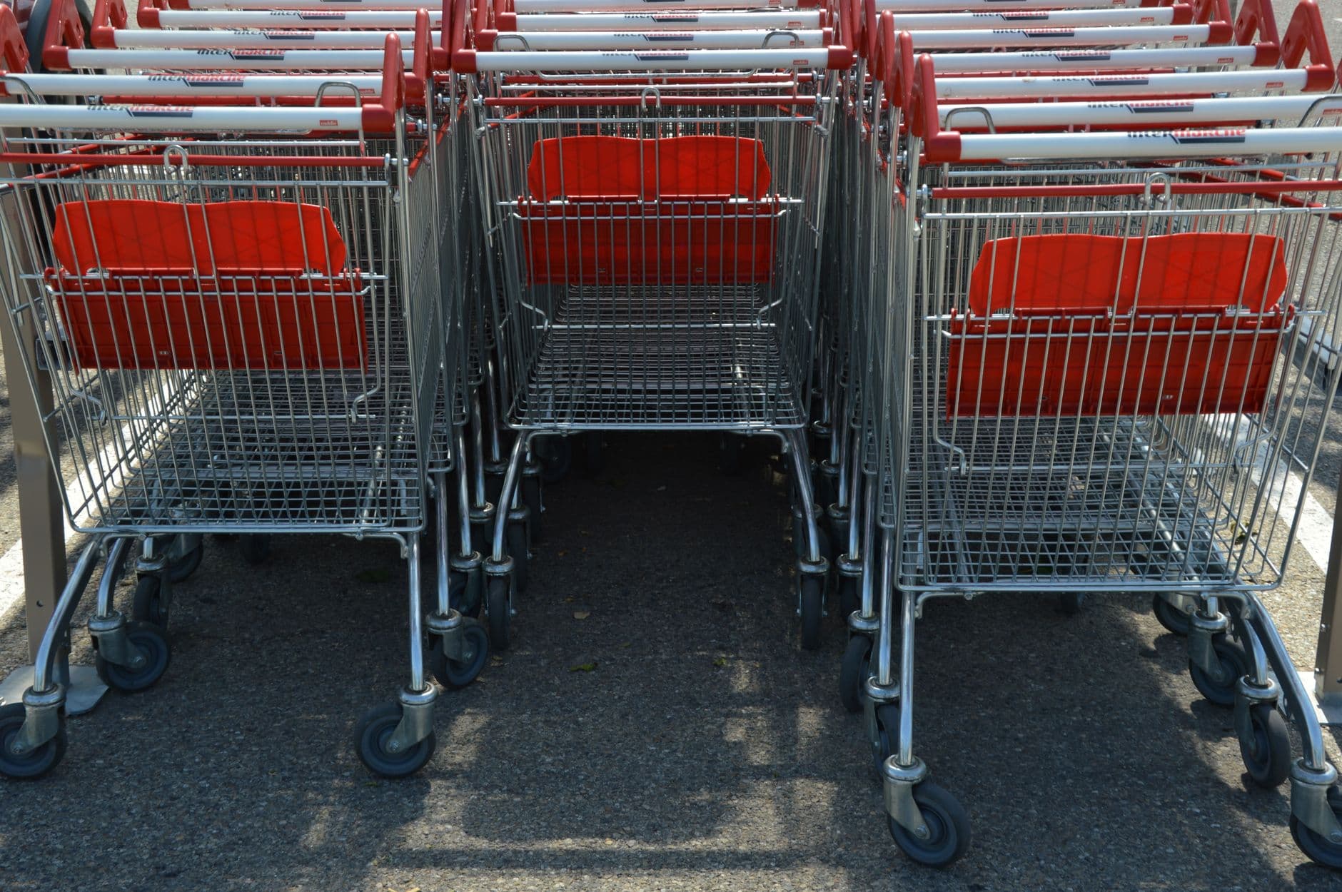 A row of nested shopping trolleys