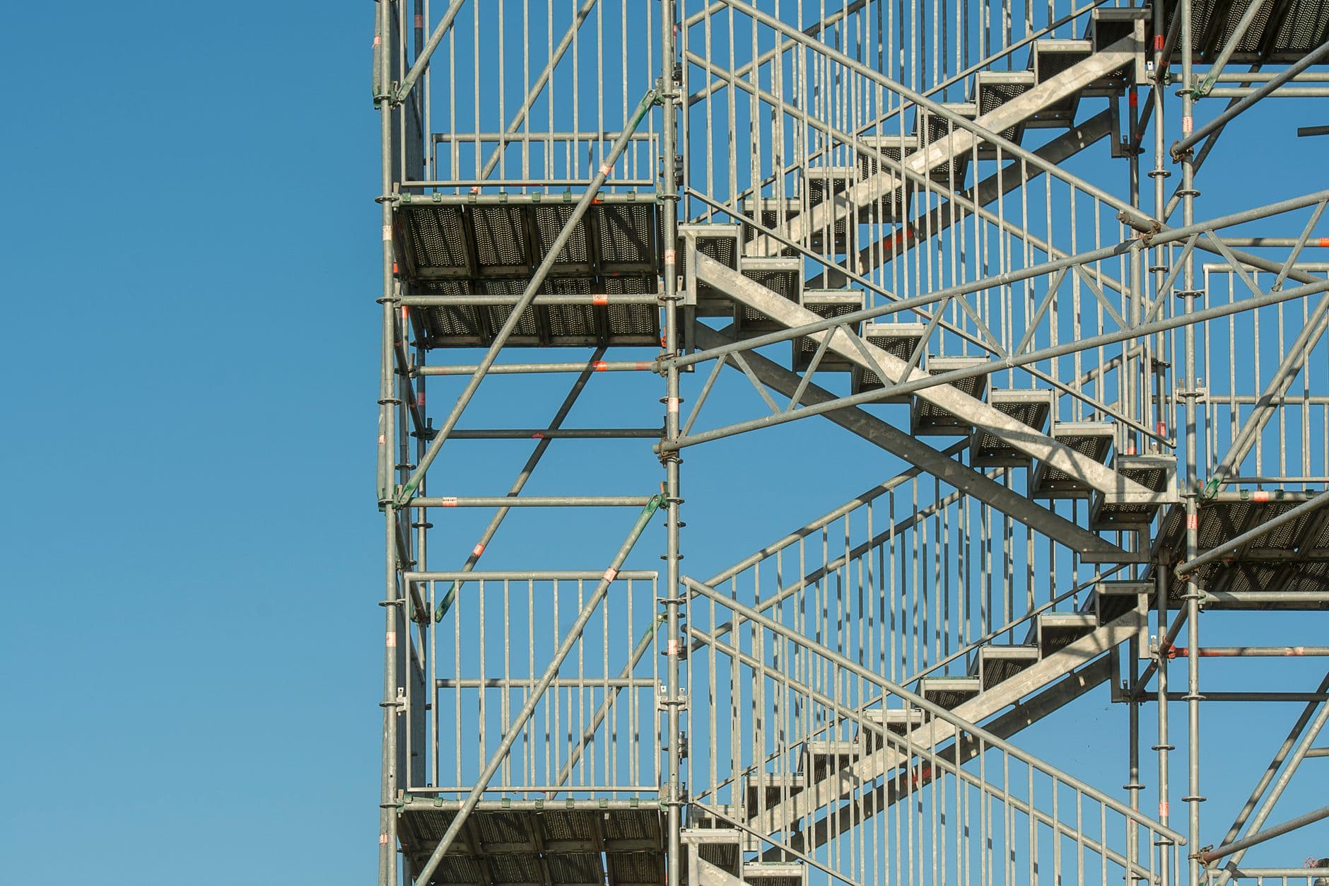Scaffolding against a clear sky