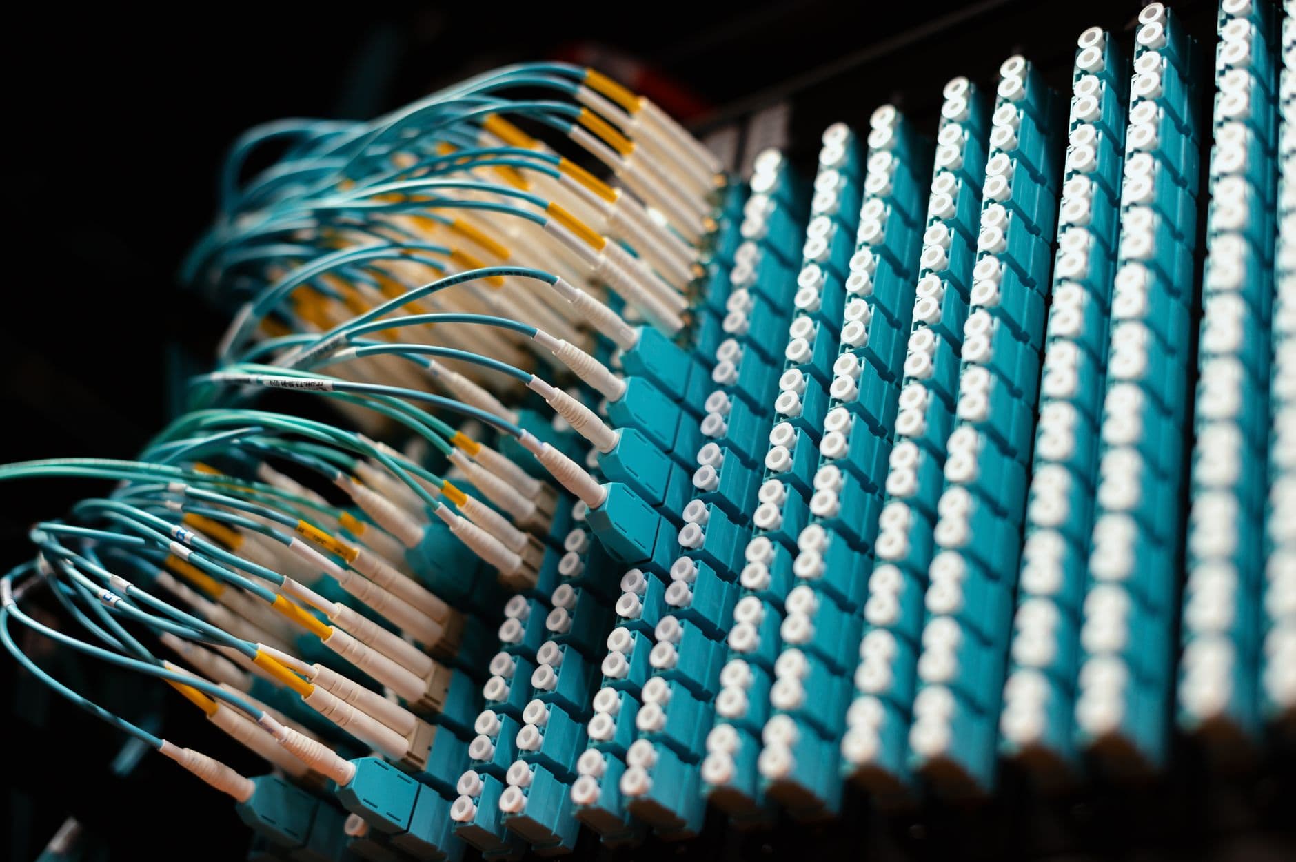 Colourful network cables in a patch panel