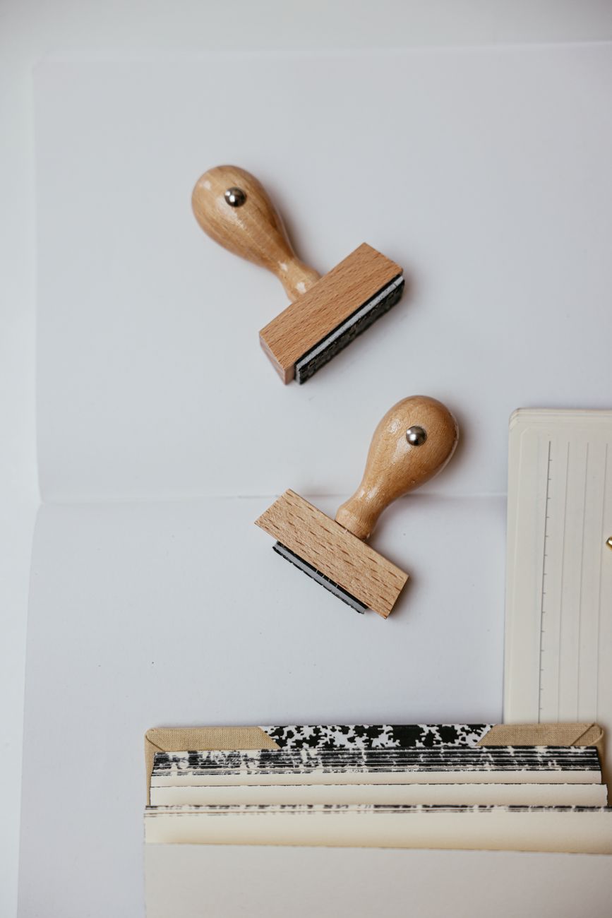 A rubber stamp resting on a document
