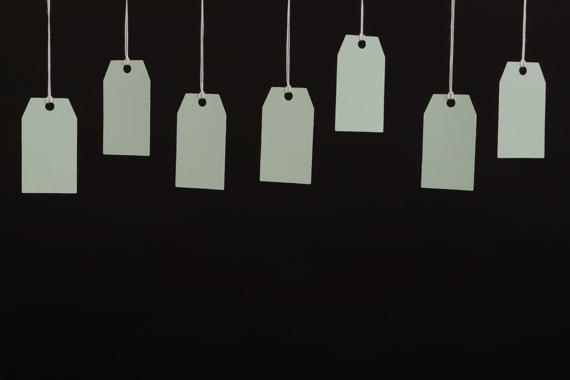 Blank tags hanging in a row