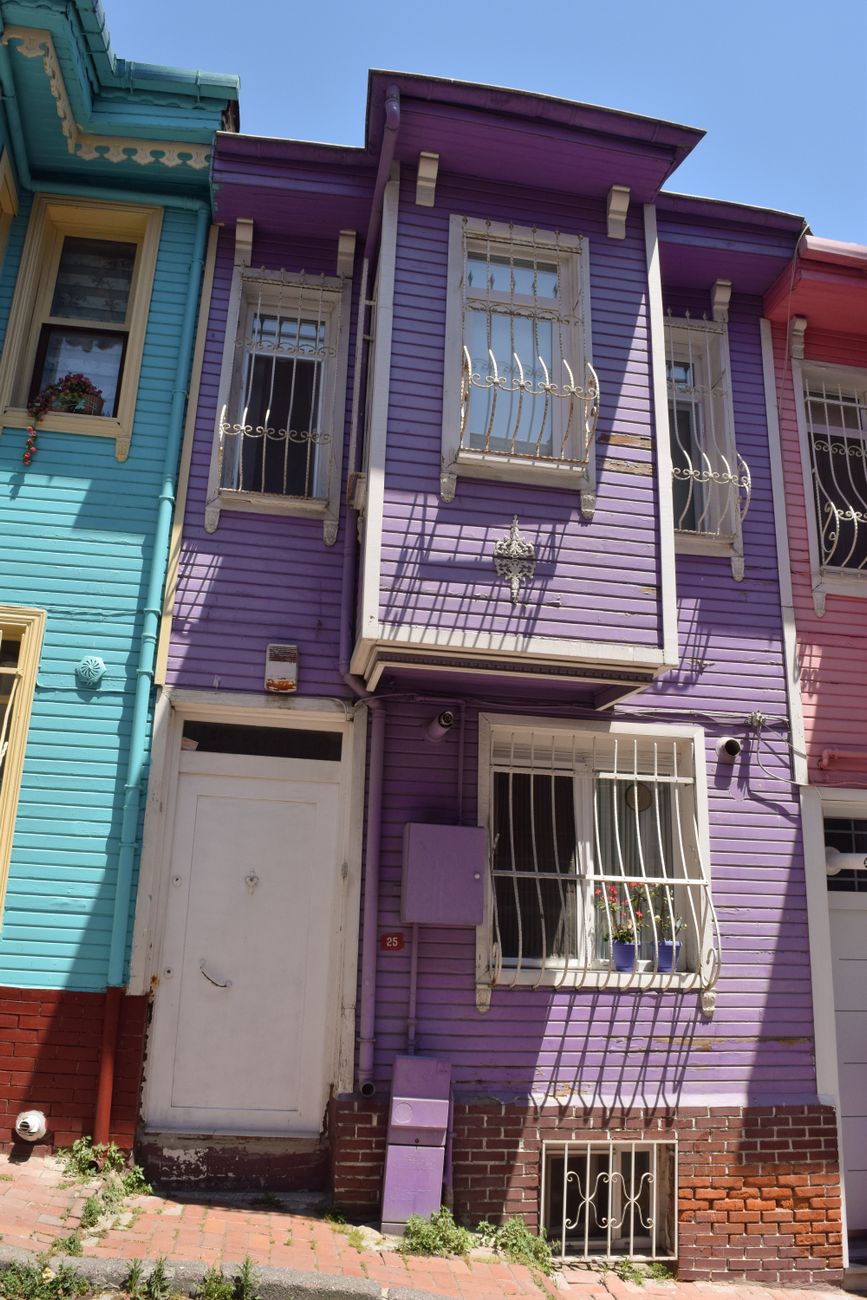 A row of colourful house facades