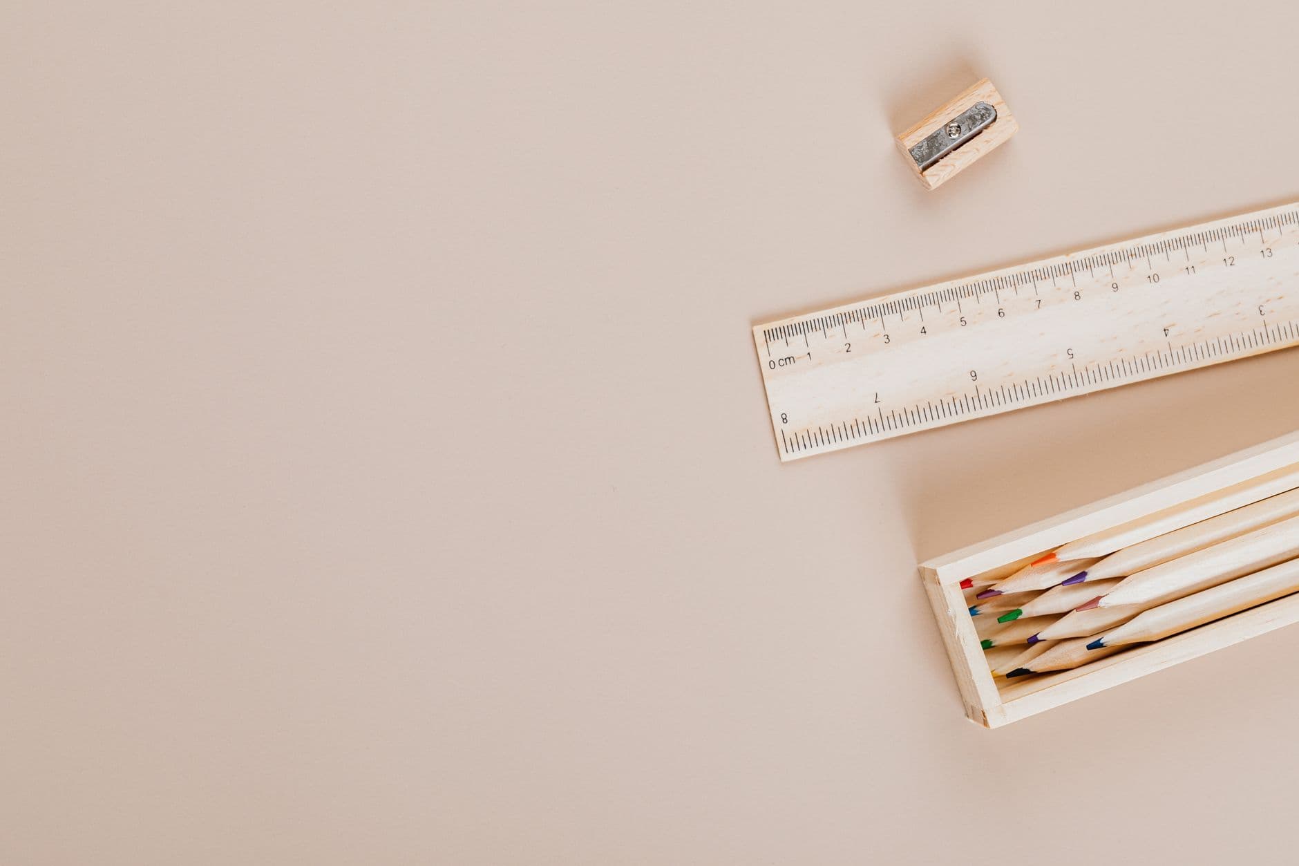 A wooden ruler on a plain white ground